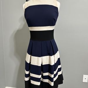 Ralph Lauren stripped a line dress in navy cream and black colors